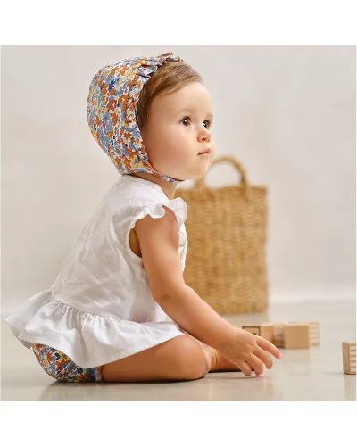 Cubrepañal de niña Claqué estampado de flores multicolor Tutto Piccolo