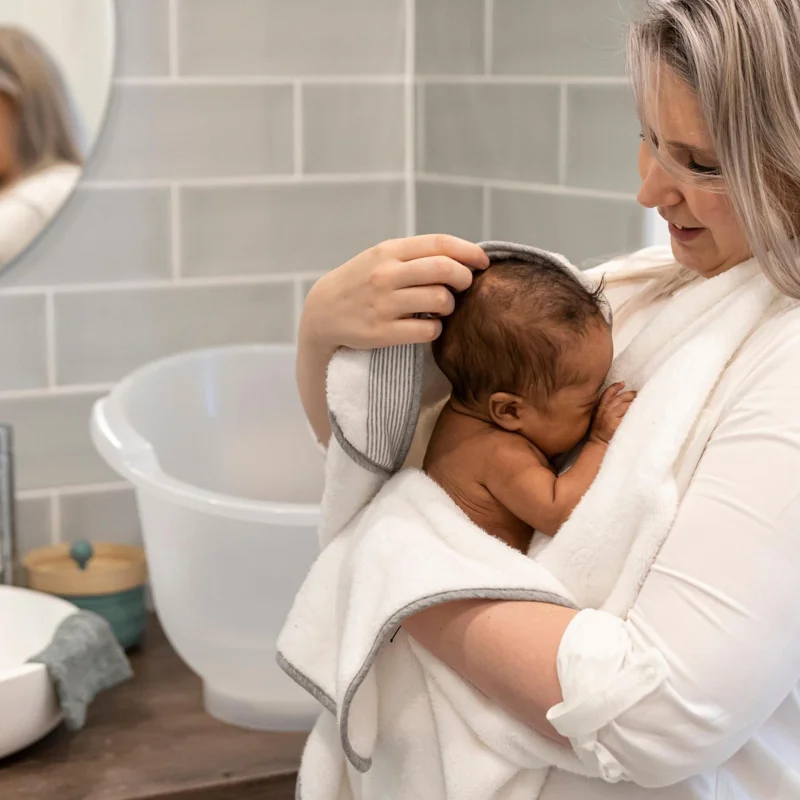 Cape de bain XL avec anneau de dentition Dry’n Play Doomoo
