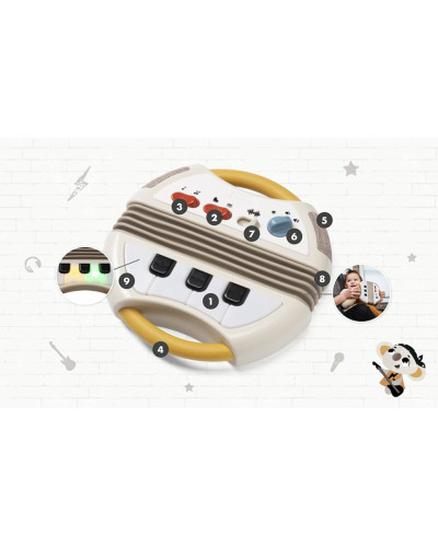 Accordéon électronique musical Tiny Rockers de Tiny Love avec soufflet, clavier et poignées